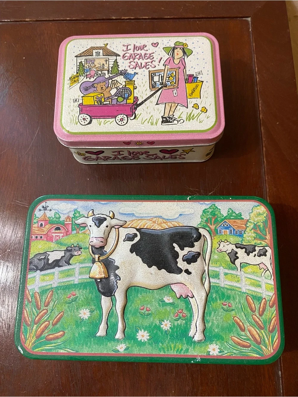 Two vintage tin containers